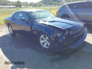 2014 Dodge Challenger SXT с VIN 2C3CDYAG8EH111141, выставлен на аукционе IAAI как лот 43374971 с пробегом 98 943 миль миль и . История ставок и продаж доступна на DreamBid. Изображение 1.