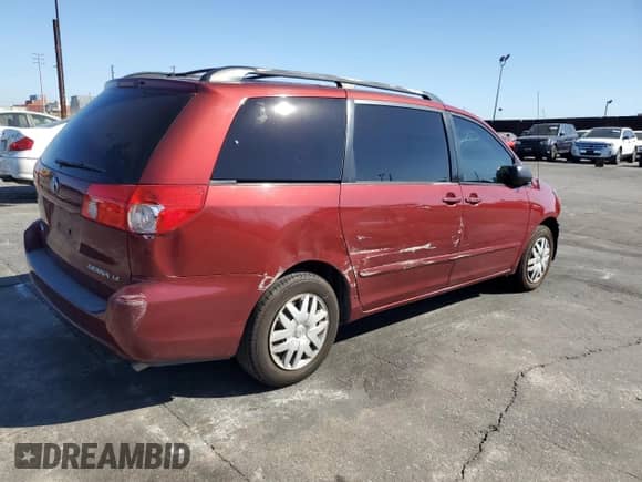 2009 Toyota Sienna LE с VIN 5TDZK23C69S258228, выставлен на аукционе Copart как лот 82336515 с пробегом 268 165 миль миль и Списание • Salvage title. История ставок и продаж доступна на DreamBid. Изображение 3.