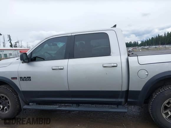 2018 Ram 1500 Rebel with VIN 1C6RR7YT5JS152633, listed as a IAAI auction lot 41788274 with 146,298 mi miles and . Bid and sale history available at DreamBid. Image 14.