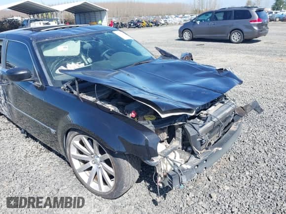 2006 Chrysler 300 C SRT-8 with VIN 2C3LA73W36H509656, listed as a IAAI auction lot 41852179 with 92,209 mi miles and . Bid and sale history available at DreamBid. Image 18.