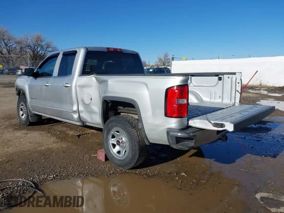 2017 GMC Sierra 1500 SLE with VIN 1GTV2MEC5HZ404851, listed as a IAAI auction lot 41733001 with 119,184 mi miles and . Bid and sale history available at DreamBid. Image 3.
