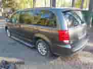 2015 Dodge Grand Caravan SXT with VIN 2C4RDGCG3FR541281, listed as a IAAI auction lot 43518583 with 130,499 mi miles and . Bid and sale history available at DreamBid. Image 3.