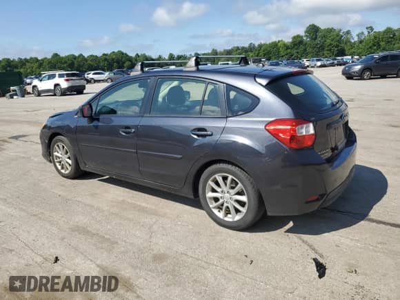 2012 Subaru Impreza Premium with VIN JF1GPAC6XCG242568, listed as a Copart auction lot 66563525 with 135,436 mi miles and Salvage title. Bid and sale history available at DreamBid. Image 2.