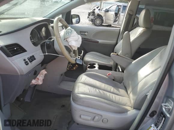 2013 Toyota Sienna XLE AAS with VIN 5TDYK3DC8DS304733, listed as a Copart auction lot 84221835 with 204,518 mi miles and Salvage title. Bid and sale history available at DreamBid. Image 7.