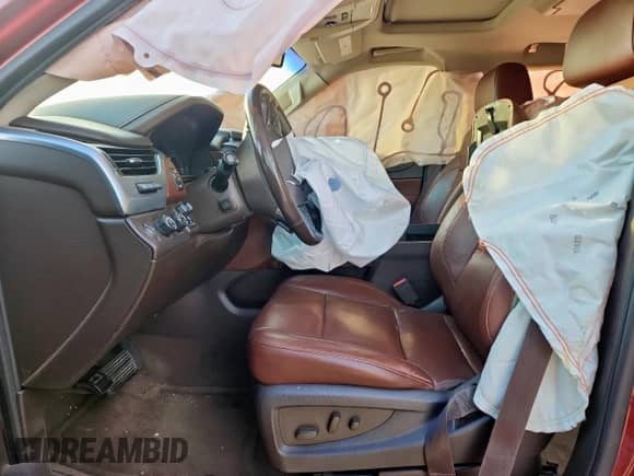 2016 Chevrolet Tahoe LTZ с VIN 1GNSKCKC0GR477553, выставлен на аукционе Copart как лот 81628955 с пробегом 200 483 миль миль и Списание • Salvage title. История ставок и продаж доступна на DreamBid. Изображение 7.