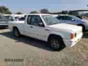1989 Dodge RAM with VIN JB7FL55E0KP006393, listed as a Copart auction lot 82760774 with 148,071 mi miles and Clean title. Bid and sale history available at DreamBid. Image 4.