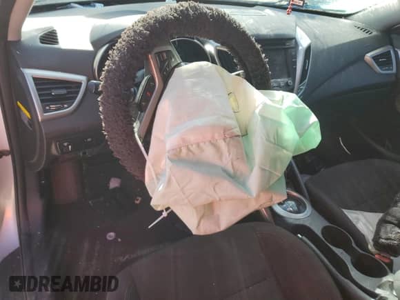 2016 Hyundai Veloster с VIN KMHTC6AD2GU289647, выставлен на аукционе Copart как лот 82610214 с пробегом 98 987 миль миль и Списание • Salvage title. История ставок и продаж доступна на DreamBid. Изображение 8.