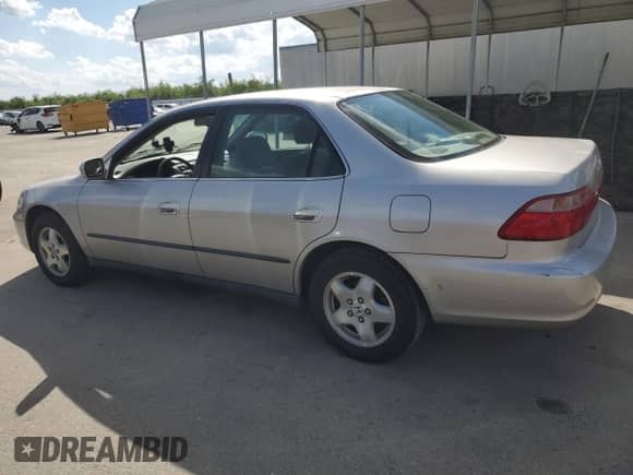 1999 Honda Accord LX with VIN 1HGCG1646XA041909, listed as a Copart auction lot 50491705 with 190,794 mi miles and Salvage title. Bid and sale history available at DreamBid. Image 2.