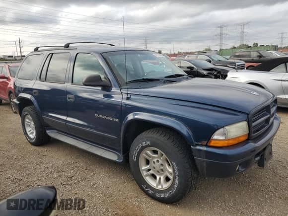 2001 Dodge Durango z VIN 1B4HS28N61F616628, wystawiony jako Copart lot #81738495 z przebiegiem 125 385 mil mil oraz Czysty tytuł • Clean title. Historia ofert i sprzedaży dostępna na DreamBid. Obrazek 4.