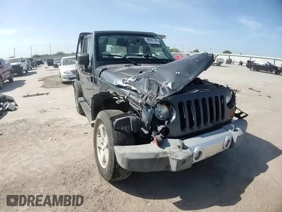 2008 Jeep Wrangler Sahara с VIN 1J4FA54128L605732, выставлен на аукционе Copart как лот 66987395 с пробегом 46 373 миль миль и Списание • Salvage title. История ставок и продаж доступна на DreamBid. Изображение 15.