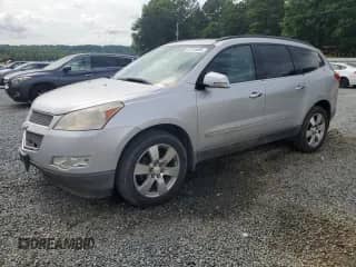 2010 Chevrolet Traverse LTZ with VIN 1GNLVHED5AS156556, listed as a Copart auction lot 61126695 with 186,069 mi miles and Salvage title. Bid and sale history available at DreamBid. Image 1.