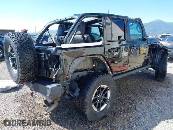 2021 Jeep Wrangler Unlimited Rubicon z VIN 1C4HJXFN0MW657900, wystawiony jako IAAI lot #42665653 z przebiegiem Nie podano mil oraz . Historia ofert i sprzedaży dostępna na DreamBid. Obrazek 4.