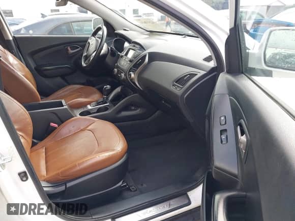 2014 Hyundai Tucson Limited z VIN KM8JU3AG2EU798972, wystawiony jako IAAI lot #42510834 z przebiegiem 269 280 mil mil oraz . Historia ofert i sprzedaży dostępna na DreamBid. Obrazek 5.