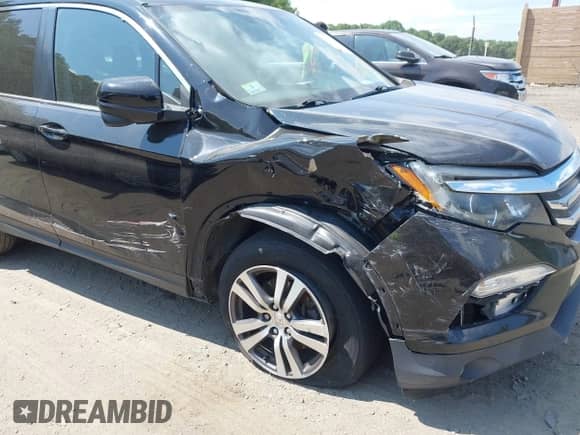 2016 Honda Pilot EX-L with VIN 5FNYF6H82GB116696, listed as a IAAI auction lot 42772248 with 200,831 mi miles and . Bid and sale history available at DreamBid. Image 6.