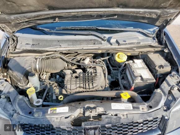 2015 Dodge Grand Caravan SXT z VIN 2C4RDGCG2FR636057, wystawiony jako Copart lot #90066125 z przebiegiem 129 377 mil mil oraz Szkoda całkowita • Salvage title. Historia ofert i sprzedaży dostępna na DreamBid. Obrazek 12.