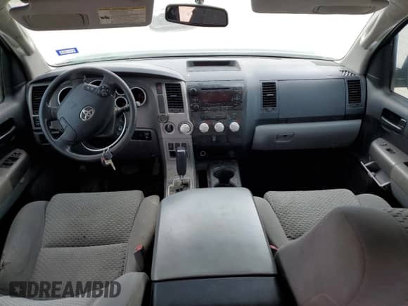 2013 Toyota Tundra с VIN 5TFDM5F16DX040602, выставлен на аукционе Copart как лот 68821364 с пробегом Не указан миль и Списание • Salvage title. История ставок и продаж доступна на DreamBid. Изображение 8.