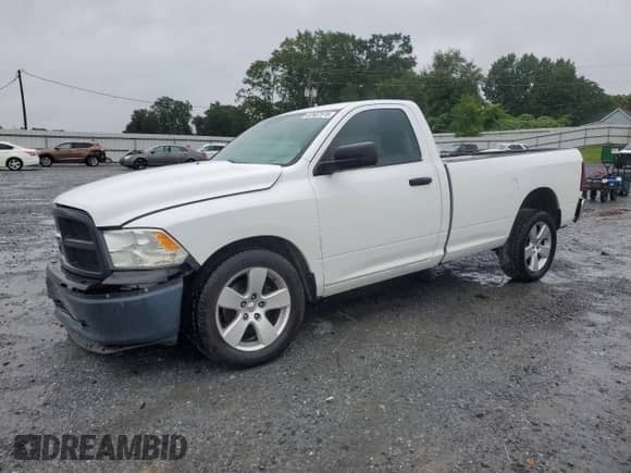 2012 Ram 1500 ST z VIN 3C6JD6DP4CG276904, wystawiony jako Copart lot #67687515 z przebiegiem 223 507 mil mil oraz Szkoda całkowita • Salvage title. Historia ofert i sprzedaży dostępna na DreamBid. Obrazek 1.