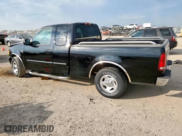 1999 Ford F-150 with VIN 1FTRX17W3XNB91574, listed as a Copart auction lot 84773145 with Not provided miles and Salvage title. Bid and sale history available at DreamBid. Image 2.