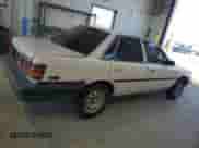 1991 Toyota Camry с VIN 4T1SV24E0MU402588, выставлен на аукционе Copart как лот 82920114 с пробегом 124 644 миль миль и Списание • Salvage title. История ставок и продаж доступна на DreamBid. Изображение 3.