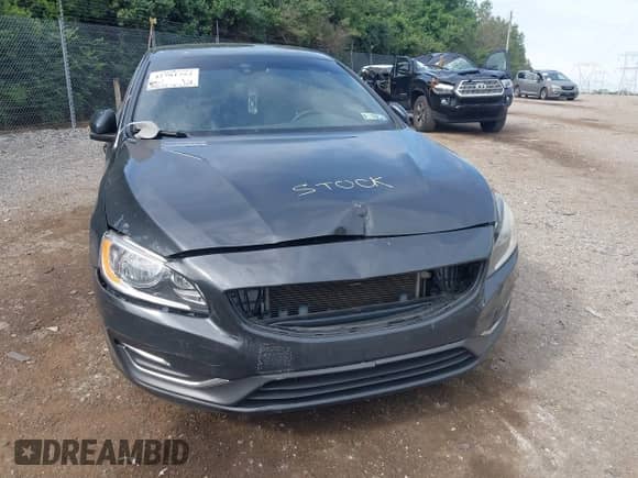 2015 Volvo S60 T5 Drive-E Premier with VIN YV126MFB9F1299878, listed as a IAAI auction lot 42781752 with 128,657 mi miles and . Bid and sale history available at DreamBid. Image 6.