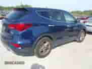 2018 Hyundai Santa Fe 2.4L z VIN 5XYZTDLB7JG562119, wystawiony jako IAAI lot #43221548 z przebiegiem 244 228 mil mil oraz . Historia ofert i sprzedaży dostępna na DreamBid. Obrazek 4.