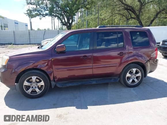 2013 Honda Pilot EX-L with VIN 5FNYF3H55DB018083, listed as a IAAI auction lot 43298601 with 240,471 mi miles and . Bid and sale history available at DreamBid. Image 6.