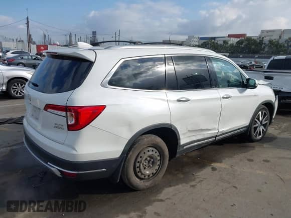 2022 Honda Pilot Elite с VIN 5FNYF6H02NB043594, выставлен на аукционе IAAI как лот 41550081 с пробегом 56 323 миль миль и . История ставок и продаж доступна на DreamBid. Изображение 4.