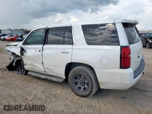 2015 Chevrolet Tahoe Commercial с VIN 1GNLC2EC0FR562690, выставлен на аукционе Copart как лот 63842085 с пробегом 182 732 миль миль и Списание • Salvage title. История ставок и продаж доступна на DreamBid. Изображение 2.