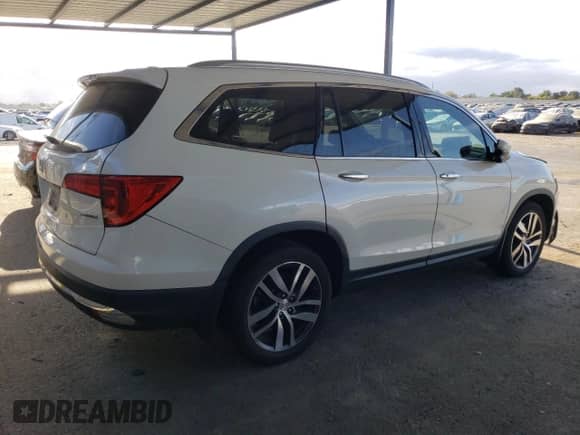 2017 Honda Pilot Touring с VIN 5FNYF5H9XHB000604, выставлен на аукционе Copart как лот 72022615 с пробегом 79 605 миль миль и Списание • Salvage title. История ставок и продаж доступна на DreamBid. Изображение 3.