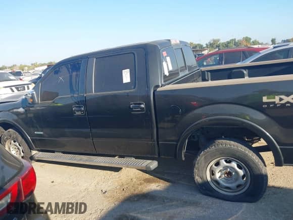 2013 Ford F-150 XL with VIN 1FTFW1ETXDKD79648, listed as a IAAI auction lot 43408641 with 181,756 mi miles and . Bid and sale history available at DreamBid. Image 13.