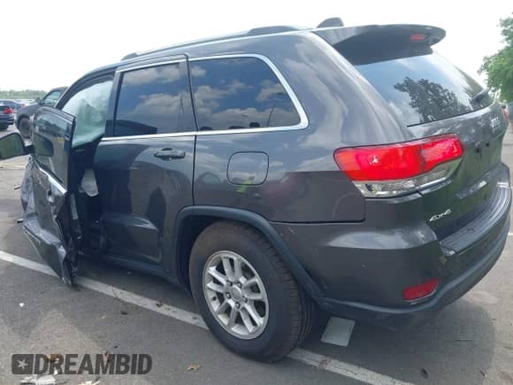 2020 Jeep Grand Cherokee Laredo E with VIN 1C4RJFAG9LC419986, listed as a IAAI auction lot 42610904 with 61,077 mi miles and . Bid and sale history available at DreamBid. Image 3.