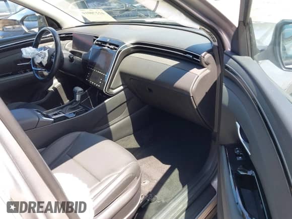 2023 Hyundai Tucson XRT with VIN KM8JFCAEXPU261133, listed as a IAAI auction lot 42270010 with 34,709 mi miles and . Bid and sale history available at DreamBid. Image 5.