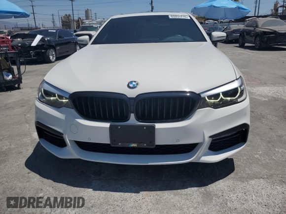 2018 BMW 5 Series 540i with VIN WBAJE5C53JWA93525, listed as a Copart auction lot 65956815 with 73,148 mi miles and Salvage title. Bid and sale history available at DreamBid. Image 5.