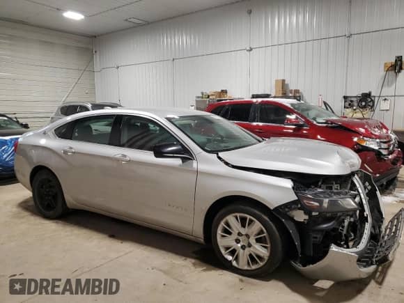 2019 Chevrolet Impala LS с VIN 2G11X5SAXK9141677, выставлен на аукционе Copart как лот 86706424 с пробегом 69 548 миль миль и Списание • Salvage title. История ставок и продаж доступна на DreamBid. Изображение 4.