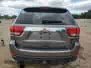 2012 Jeep Grand Cherokee Limited z VIN 1C4RJFBG5CC102608, wystawiony jako Copart lot #70375545 z przebiegiem 103 079 mil mil oraz Szkoda całkowita • Salvage title. Historia ofert i sprzedaży dostępna na DreamBid. Obrazek 6.