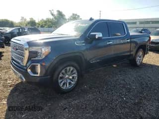 2021 GMC Sierra 1500 Denali z VIN 3GTU9FED5MG481788, wystawiony jako Copart lot #68946235 z przebiegiem 74 157 mil mil oraz Czysty tytuł • Clean title. Historia ofert i sprzedaży dostępna na DreamBid. Obrazek 1.