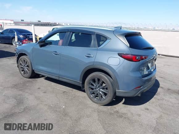 2022 Mazda CX-5 S Preferred z VIN JM3KFBCM2N1565165, wystawiony jako IAAI lot #42507203 z przebiegiem 39 853 mil mil oraz . Historia ofert i sprzedaży dostępna na DreamBid. Obrazek 3.