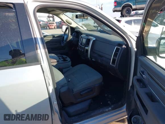 2018 Ram 1500 SLT with VIN 1C6RR6GG2JS119281, listed as a IAAI auction lot 41897492 with 242,877 mi miles and . Bid and sale history available at DreamBid. Image 5.