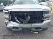 2017 Chevrolet Silverado 1500 LT with VIN 1GCVKREC5HZ328321, listed as a IAAI auction lot 42818538 with 137,263 mi miles and . Bid and sale history available at DreamBid. Image 6.