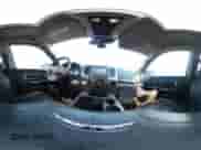 2015 Ram 1500 Laramie Longhorn with VIN 1C6RR7PT9FS515945, listed as a IAAI auction lot 42706618 with 153,693 mi miles and . Bid and sale history available at DreamBid. Image 18.