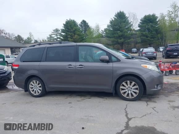 2012 Toyota Sienna XLE with VIN 5TDDK3DC2CS043855, listed as a IAAI auction lot 42189680 with 195,788 mi miles and . Bid and sale history available at DreamBid. Image 13.