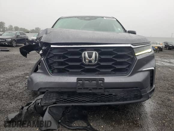 2023 Honda Pilot LX с VIN 5FNYG1H20PB024353, выставлен на аукционе Copart как лот 69205025 с пробегом 52 050 миль миль и Списание • Salvage title. История ставок и продаж доступна на DreamBid. Изображение 5.