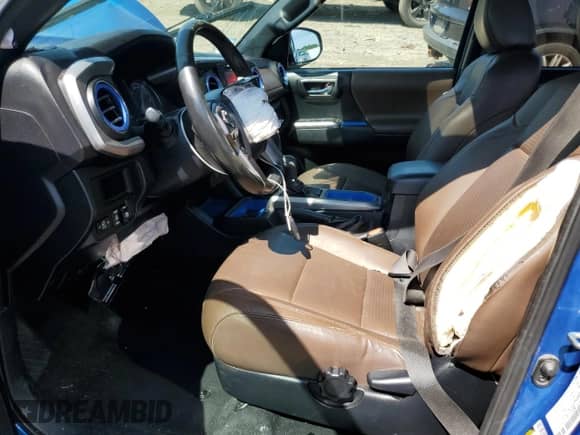 2017 Toyota Tacoma Limited with VIN 3TMGZ5AN5HM057587, listed as a Copart auction lot 67936135 with 173,354 mi miles and Salvage title. Bid and sale history available at DreamBid. Image 7.