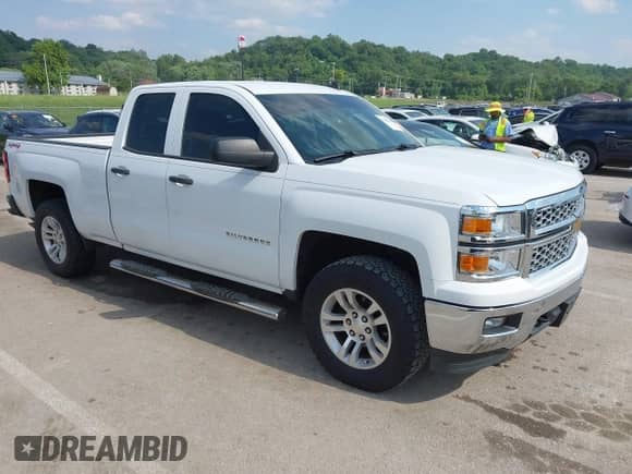 2014 Chevrolet Silverado 1500 LT with VIN 1GCVKREC5EZ412652, listed as a IAAI auction lot 42420856 with 165,891 mi miles and . Bid and sale history available at DreamBid. Image 1.