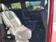 2014 Dodge Grand Caravan SXT 30th Anniversary with VIN 2C4RDGCG4ER335658, listed as a IAAI auction lot 43380204 with 129,746 mi miles and . Bid and sale history available at DreamBid. Image 8.