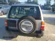 2002 Chevrolet Tracker с VIN 2CNBE13C326912813, выставлен на аукционе Copart как лот 81281745 с пробегом 238 193 миль миль и Списание • Salvage title. История ставок и продаж доступна на DreamBid. Изображение 6.