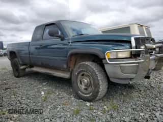 1999 Dodge 2500 с VIN 3B7KF236XXG233571, выставлен на аукционе Copart как лот 72592134 с пробегом Не указан миль и На запчасти • Non repairable. История ставок и продаж доступна на DreamBid. Изображение 4.