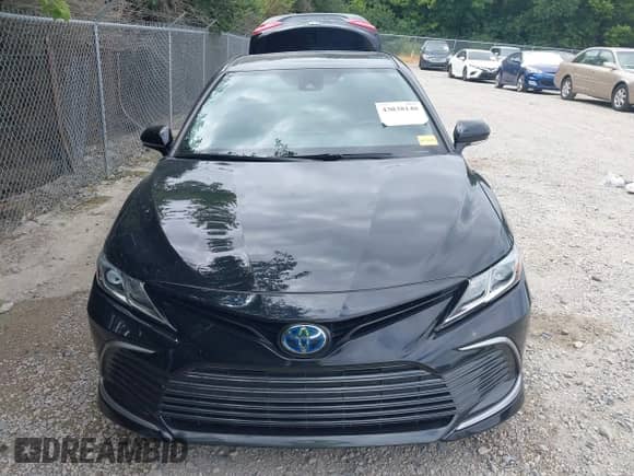 2022 Toyota Camry Hybrid LE with VIN 4T1C31AK3NU574937, listed as a IAAI auction lot 43038140 with 50,708 mi miles and . Bid and sale history available at DreamBid. Image 13.