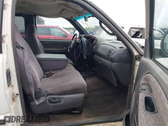1999 Dodge 1500 with VIN 3B7HF13Z4XG180008, listed as a IAAI auction lot 42200019 with 216,117 mi miles and . Bid and sale history available at DreamBid. Image 5.