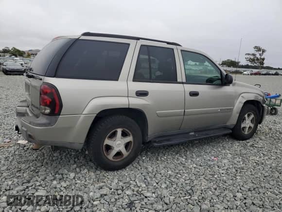 2003 Chevrolet TrailBlazer LT с VIN 1GNDT13S932200399, выставлен на аукционе Copart как лот 68914455 с пробегом 183 779 миль миль и Списание • Salvage title. История ставок и продаж доступна на DreamBid. Изображение 3.